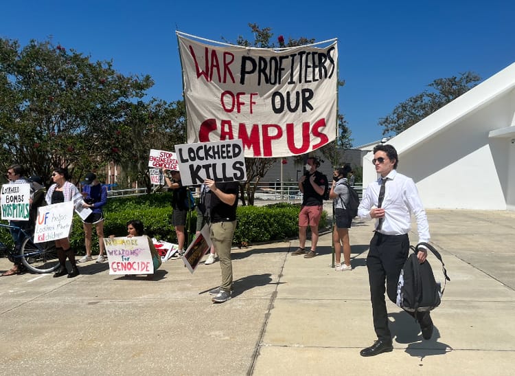 UF Divest Coalition Protests Weapons Companies at Steven O’ Connell Center Career Fair