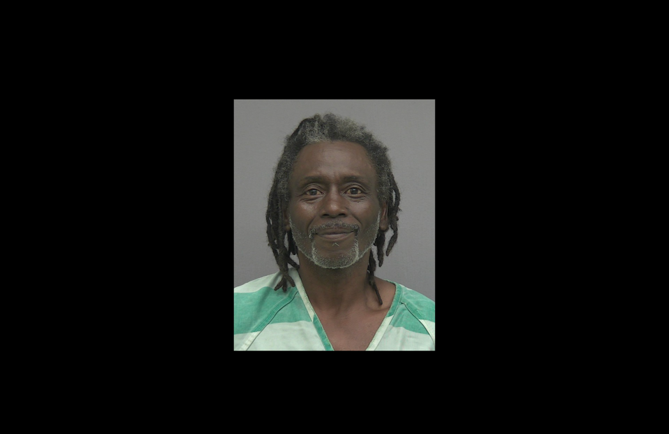 Man Smiles in Mugshot After Domestic Battery Arrest