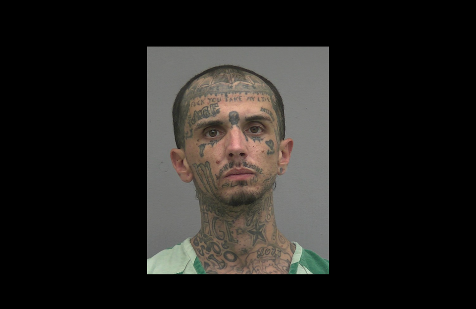 Man With Monster Energy Face Tattoo Arrested For False Imprisonment, Dating Violence and Hindering 911 Communications